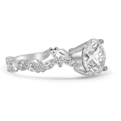 Stunning engagement ring with round center diamond and alternating round and marquise accent diamonds