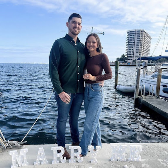 Happily engaged couple after proposal